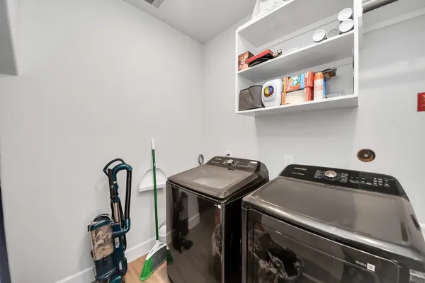 a utility room with dryer and washer