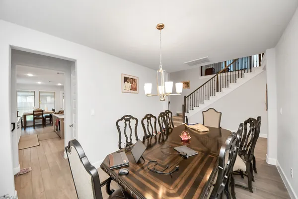 a view of a dining room with furniture