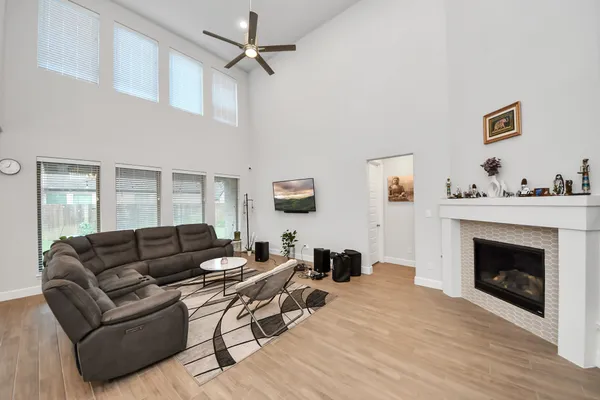 a living room with furniture and a large window