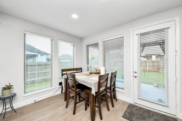 a kitchen island with stainless steel appliances kitchen island a sink a stove and a refrigerator