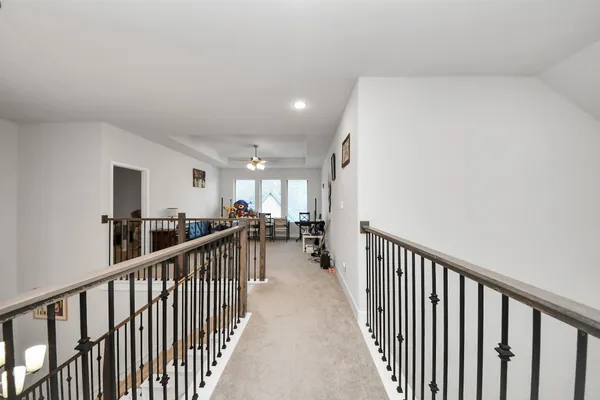 a view of backyard with barbeque grill and a small yard