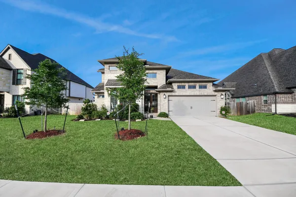 a house view with a garden space