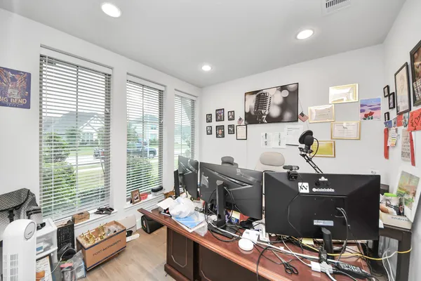 a workspace with furniture and a window