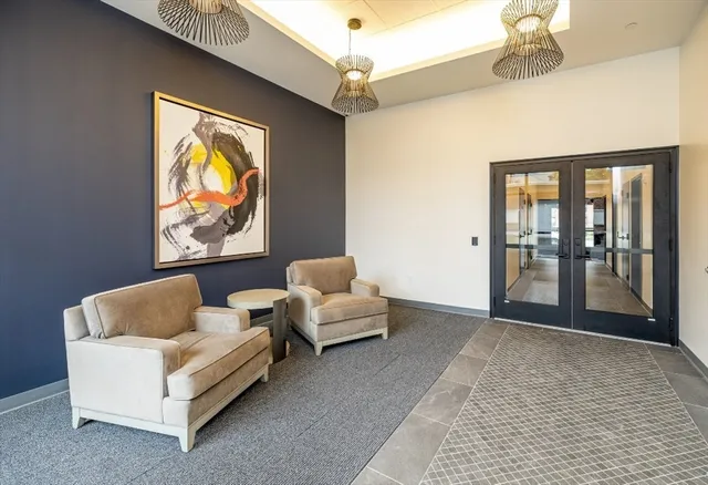 a living room with furniture and a gate