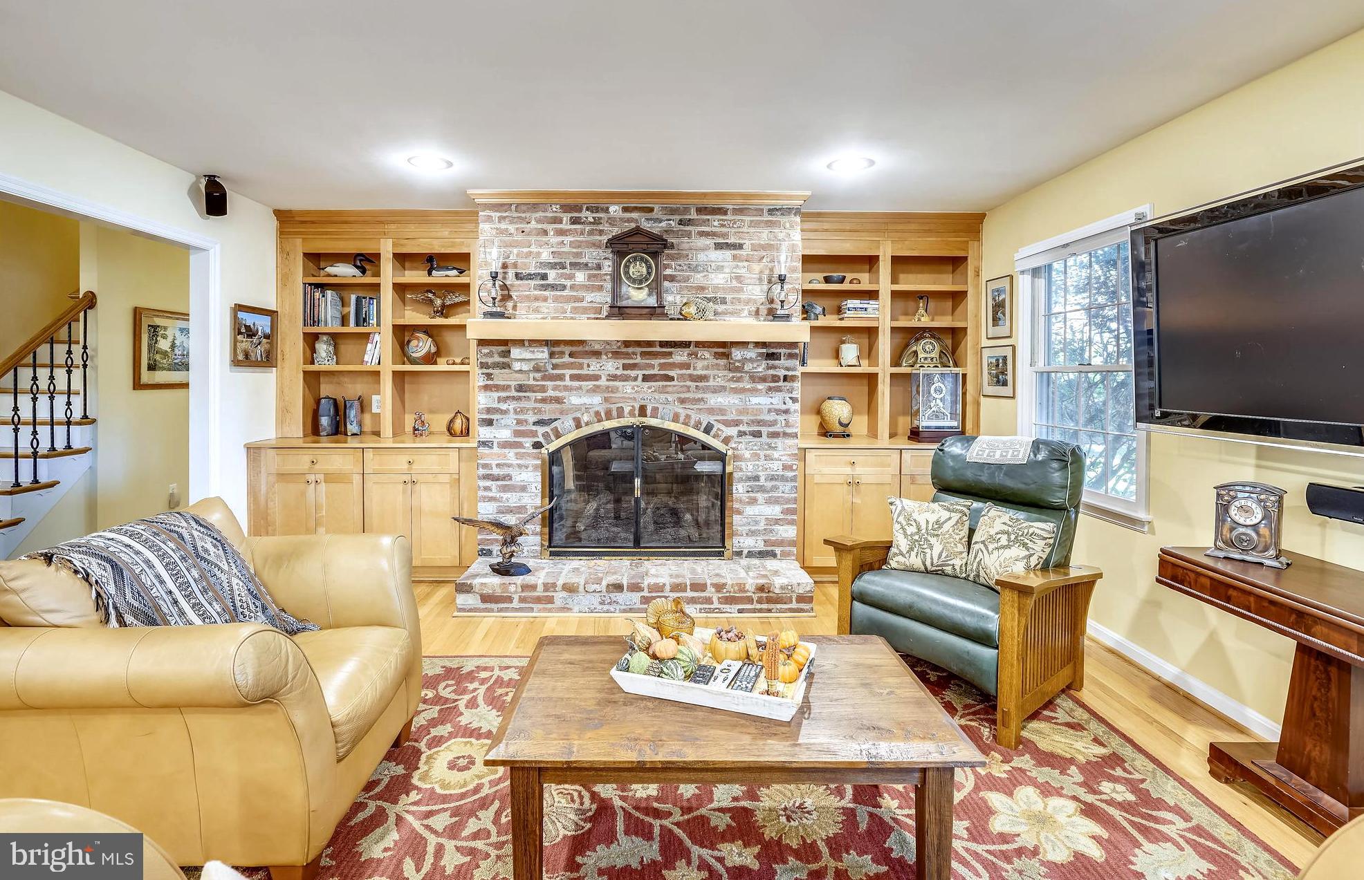 2520 Bennett Point Road Queenstown, MD 21658 - Photo 24 of 51 Shared Fireplace Ambiance . Built-In Bookcases