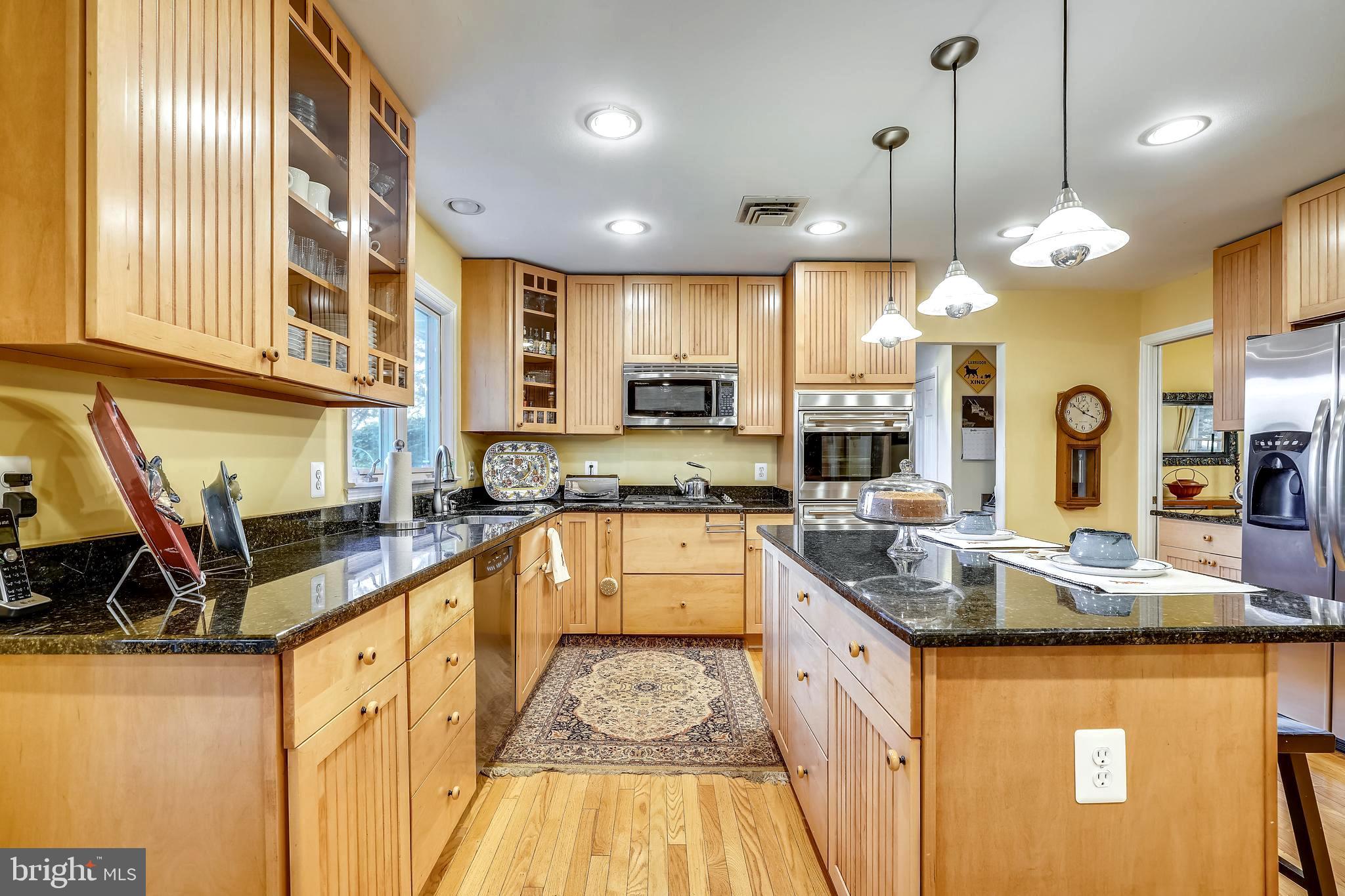 2520 Bennett Point Road Queenstown, MD 21658 - Photo 29 of 51 Custom Beadboard Cabinetry . Granite Counters