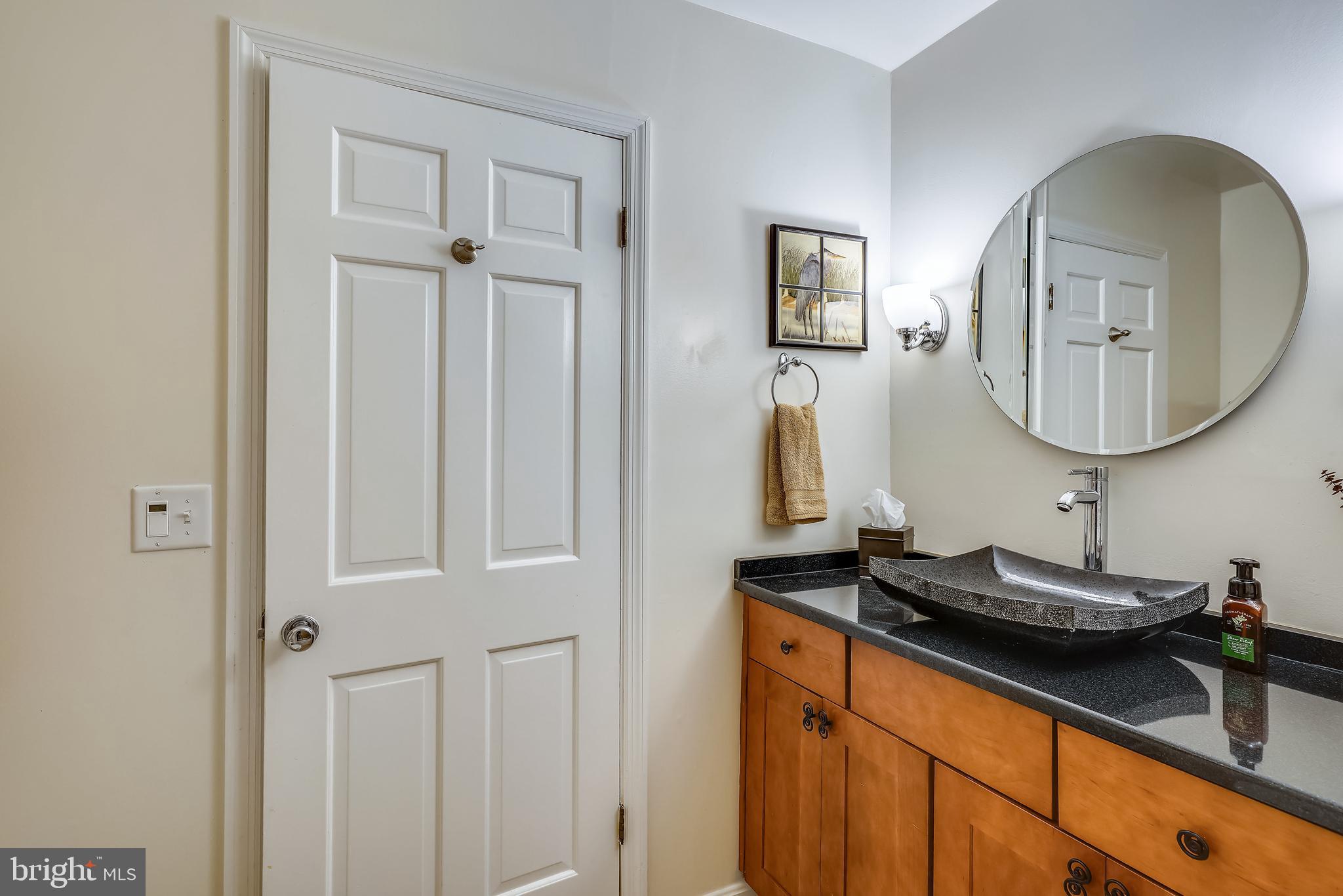2520 Bennett Point Road Queenstown, MD 21658 - Photo 41 of 51 Granite-Topped Vanity with Modern Vessel Sink