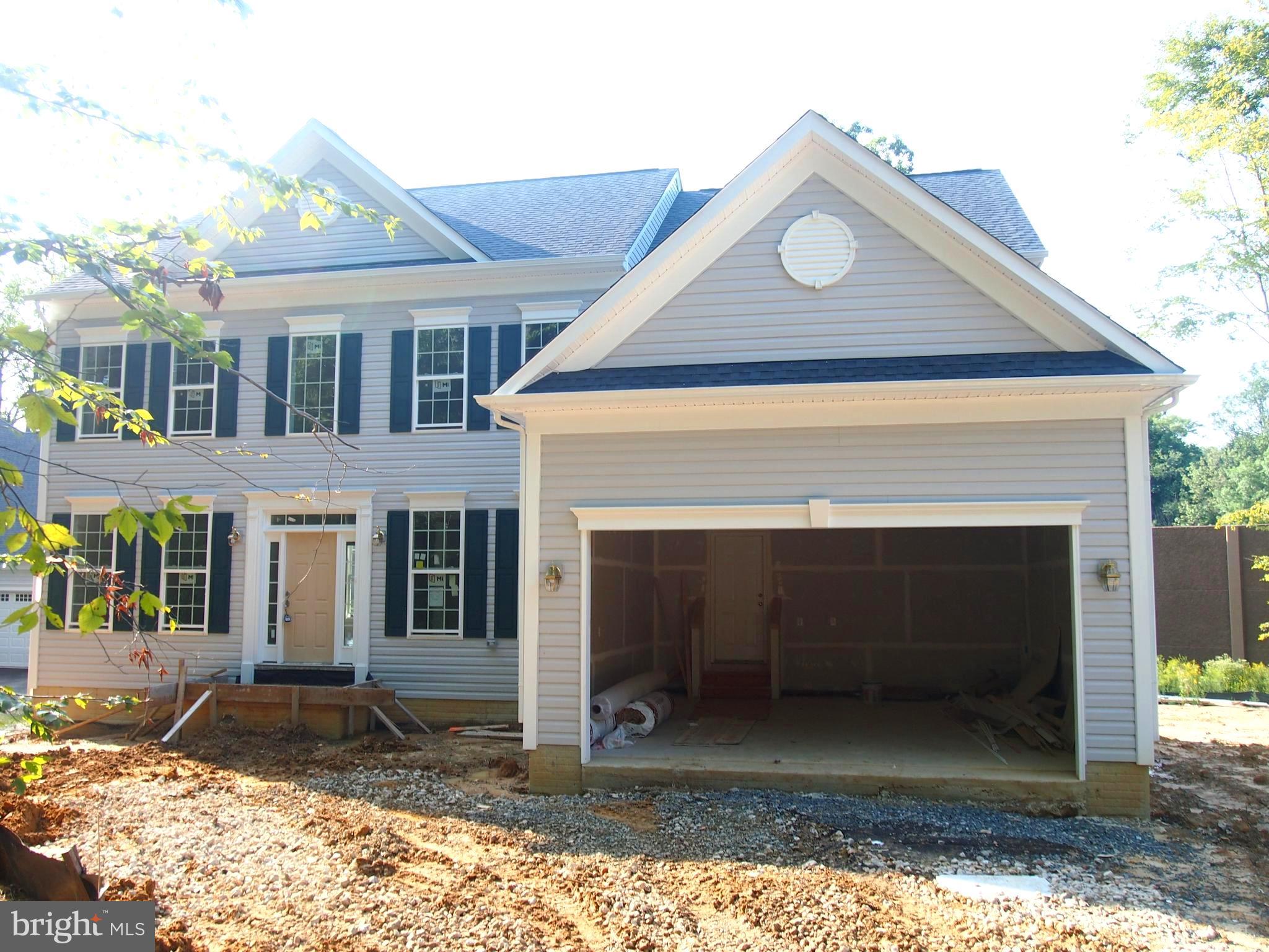 6510 Lawyers Hill Road Elkridge, MD 21075 - Photo 1 of 28 a front view of a house with yard