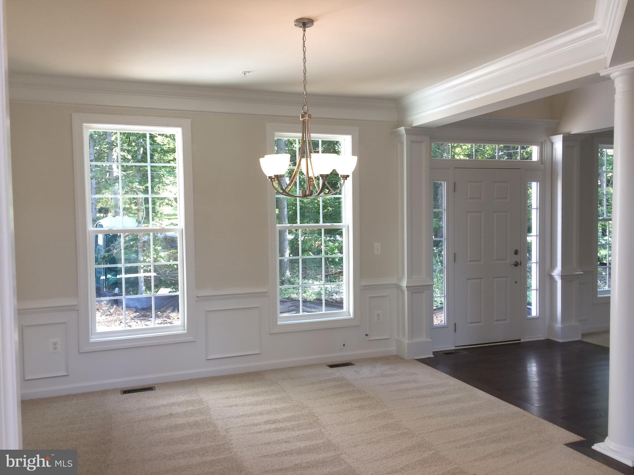 6510 Lawyers Hill Road Elkridge, MD 21075 - Photo 17 of 28 a view of an empty room with wooden floor and a window