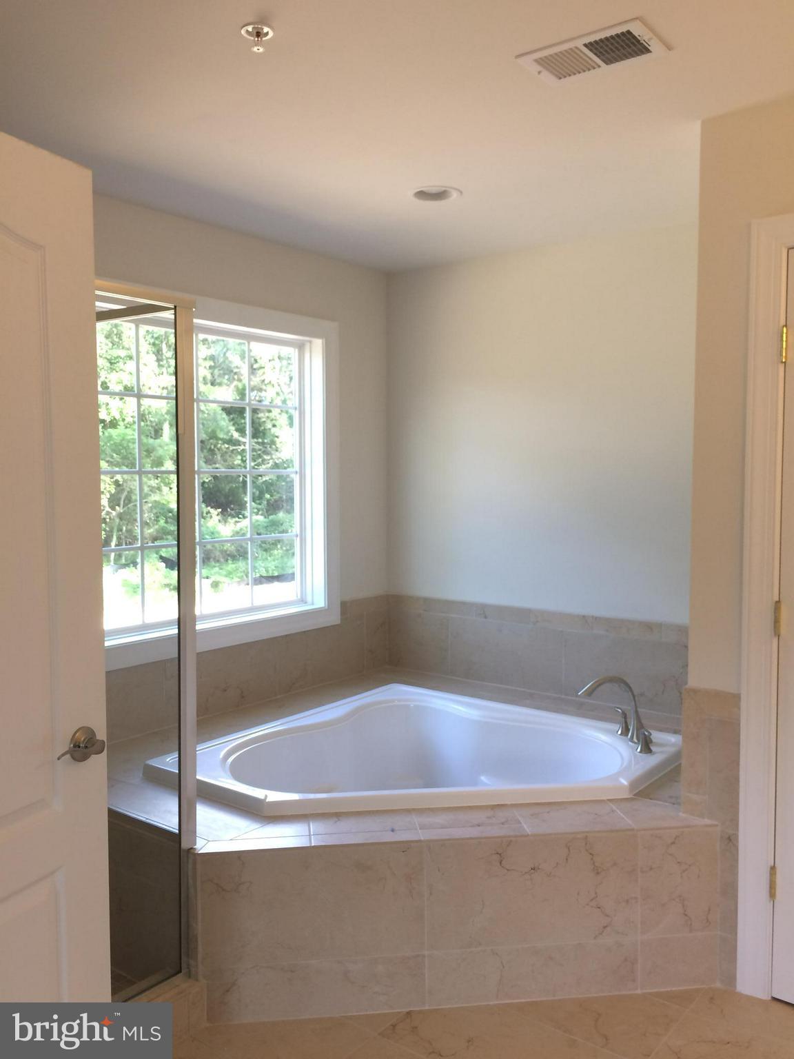 6510 Lawyers Hill Road Elkridge, MD 21075 - Photo 21 of 28 a view of walk in closet with window