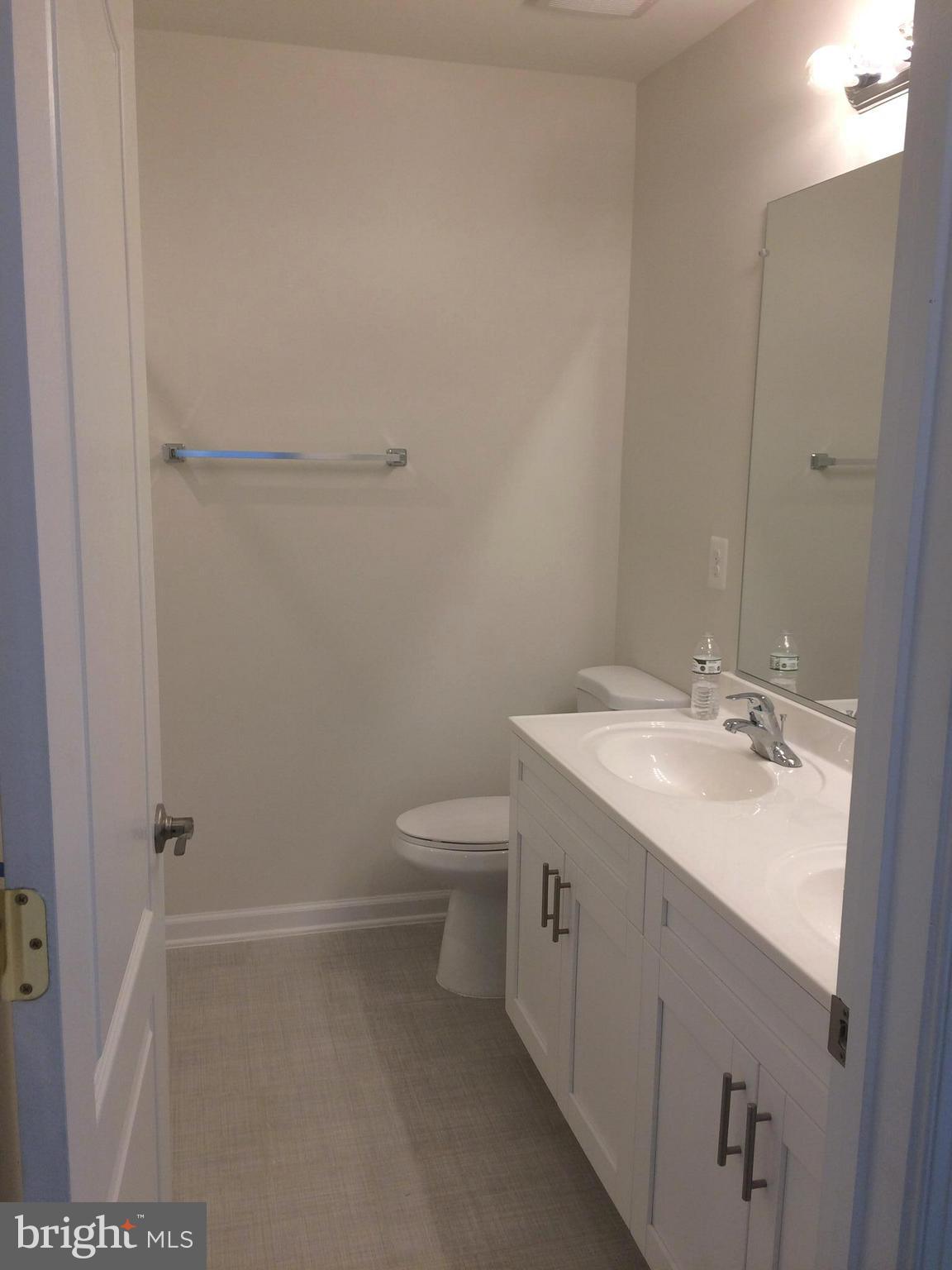 6510 Lawyers Hill Road Elkridge, MD 21075 - Photo 23 of 28 a bathroom with a sink and shower