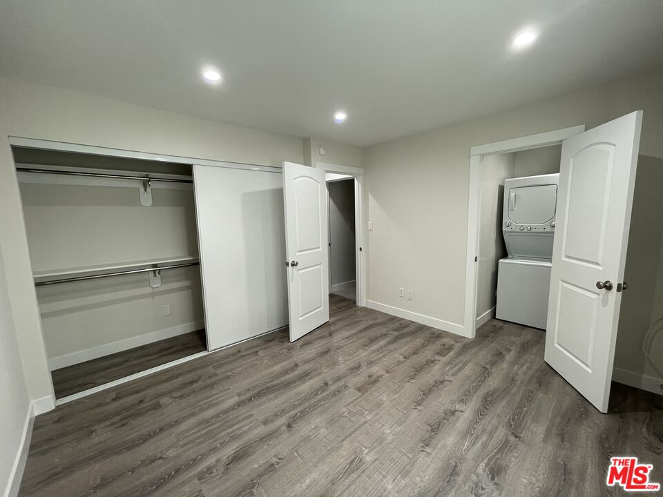 27 Anchorage Street, Unit B Marina del Rey, CA 90292 - Photo 12 of 15 a view of empty room with wooden floor