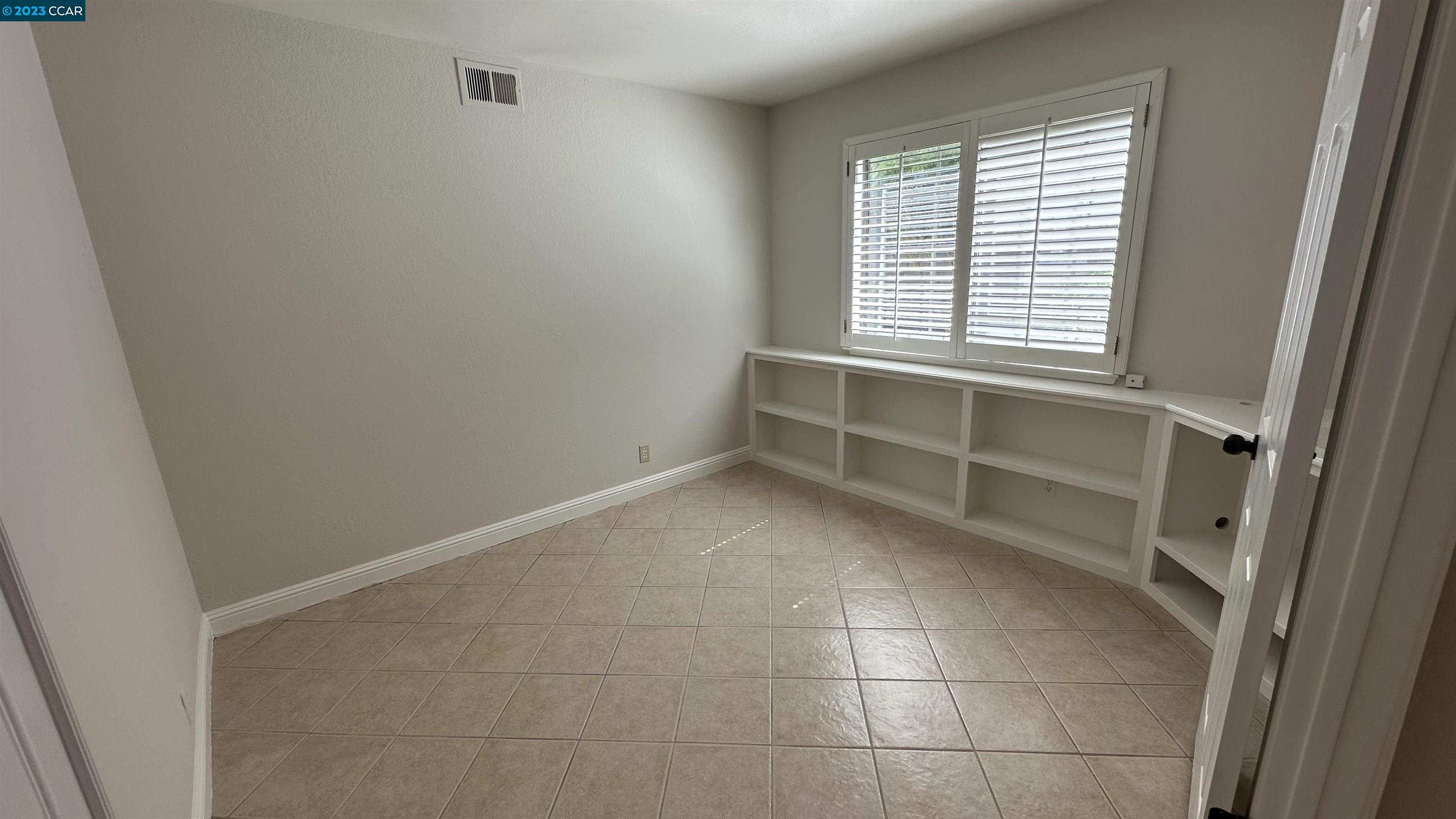 61 Rainbow Circle Danville, CA 94506 - Photo 10 of 22 a view of an empty room with a window