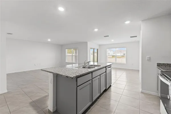 an empty room with a empty space and window