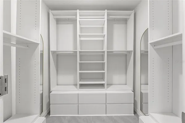 a bathroom with a sink and shower