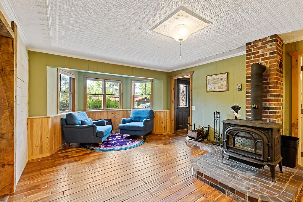 14 South Hatch Hill Road Greene, ME 04236 - Photo 10 of 56 Wood stove and sitting area
