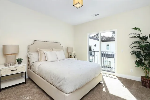 a view of white house with white walls