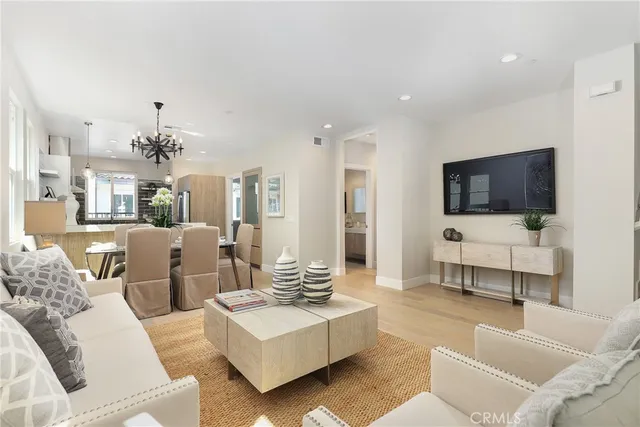 a kitchen with stainless steel appliances a refrigerator and a sink