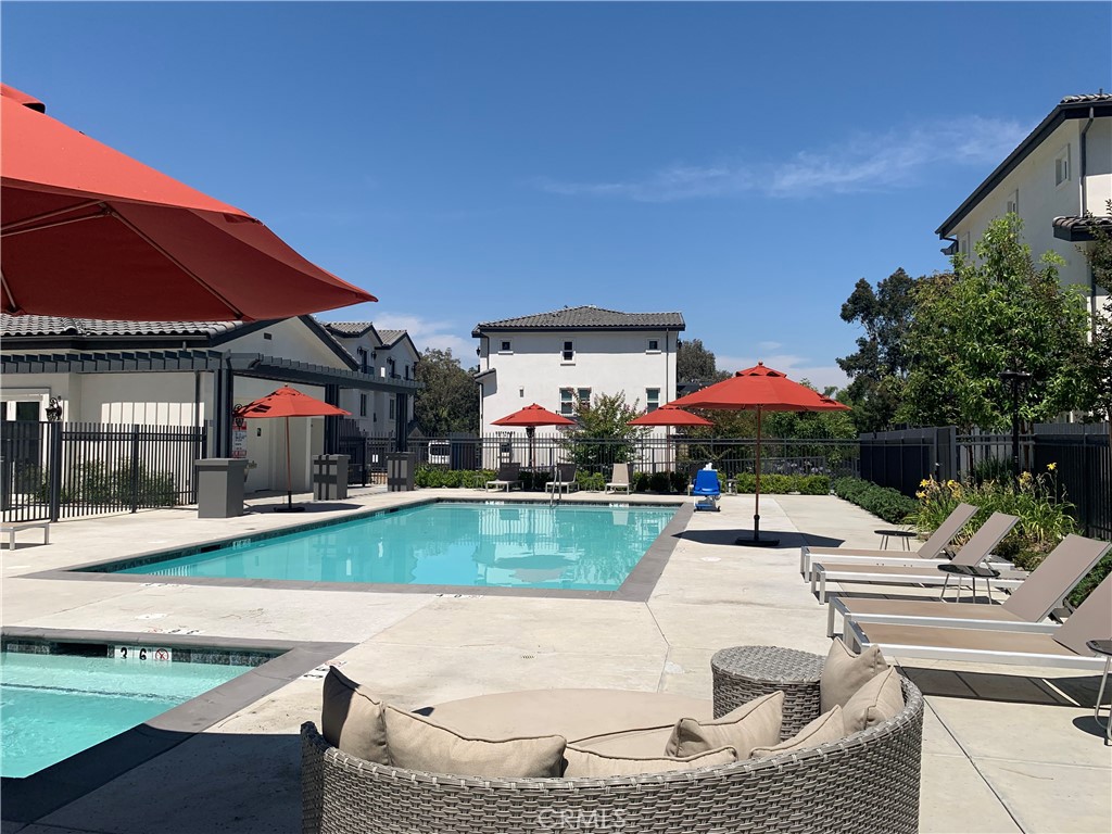 32 Spyglass Avenue Phillips Ranch, CA 91766 - Photo 55 of 63 a view of a house with swimming pool and sitting area