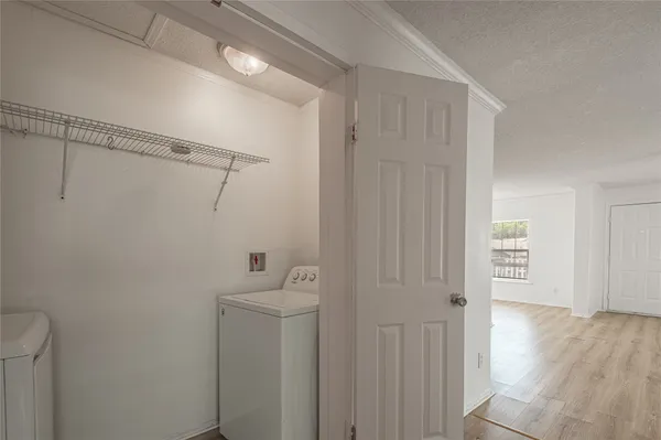 a bathroom with a shower a toilet and sink