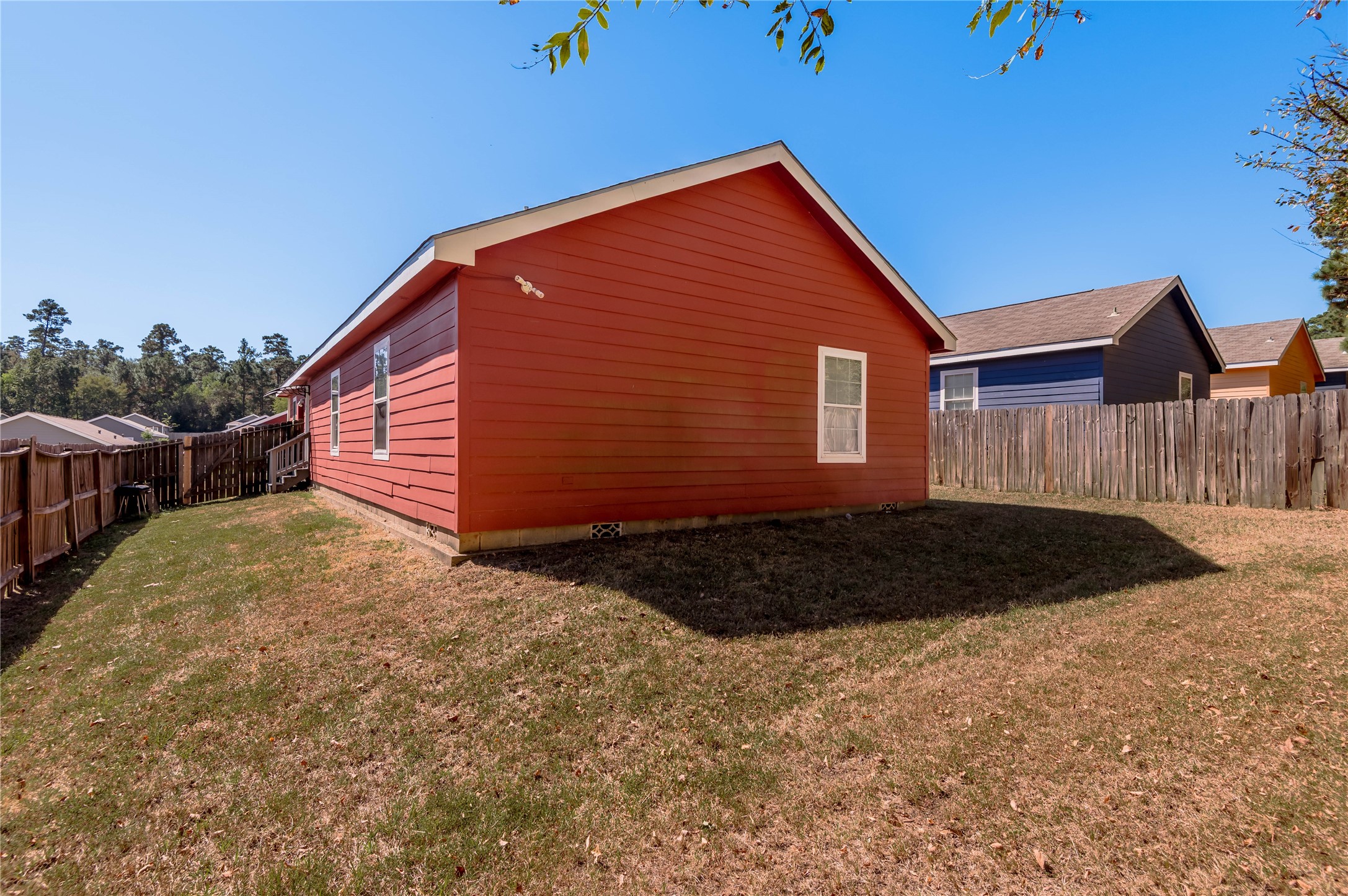 112 Varsity Circle Huntsville, TX 77340 - Photo 33 of 33 a backyard of a house
