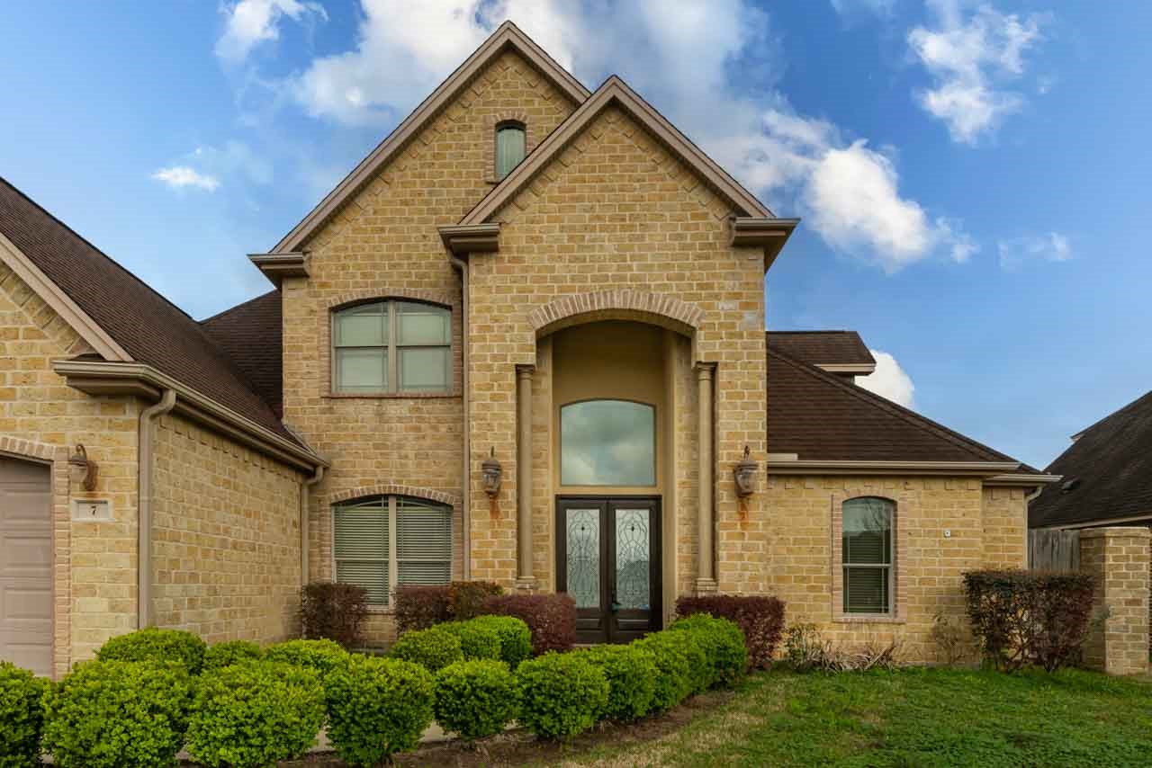 7 Stonebrook Court Beaumont, TX 77706 - Photo 2 of 35 front view of a house with a yard