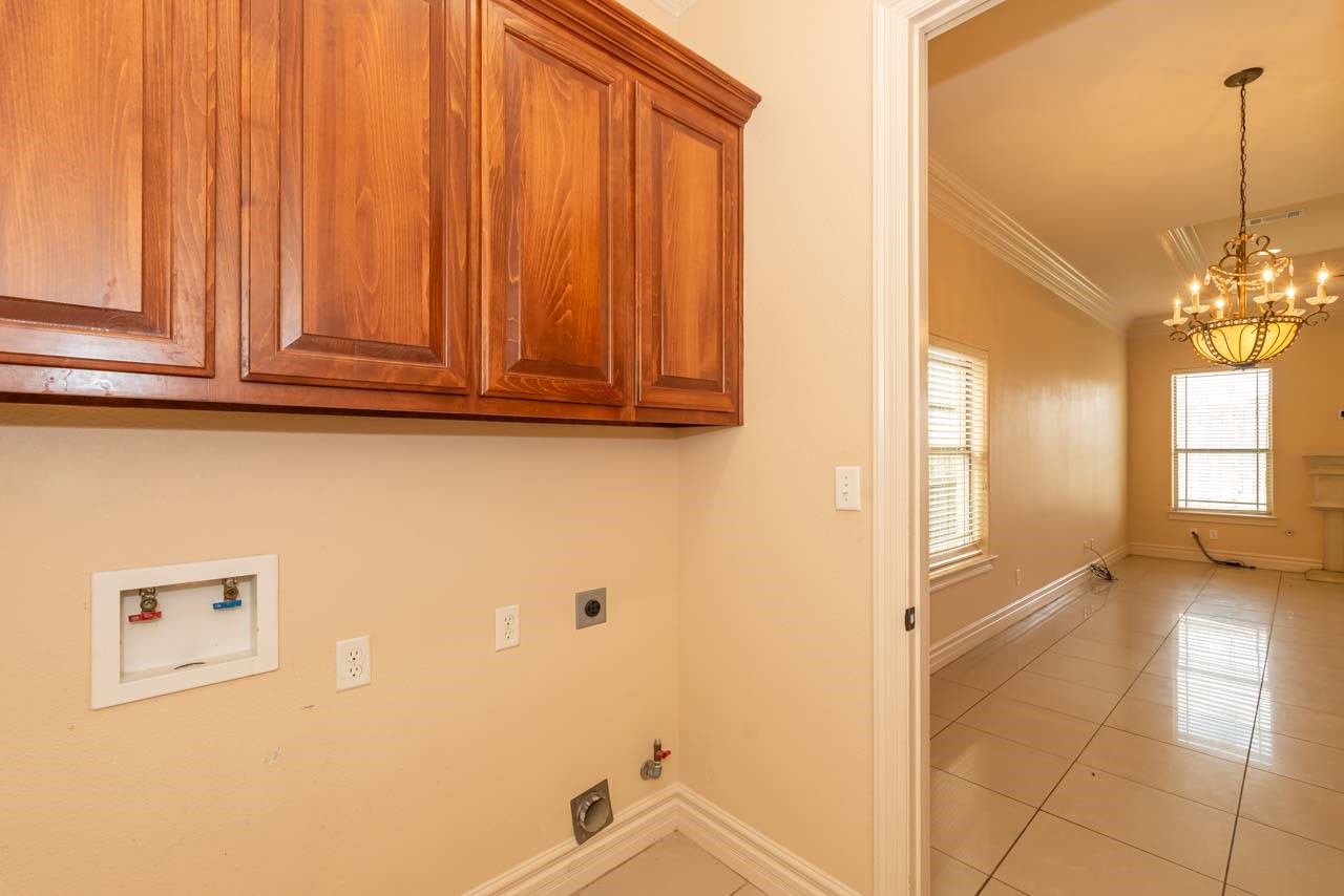 7 Stonebrook Court Beaumont, TX 77706 - Photo 23 of 35 a bathroom with a sink and a mirror