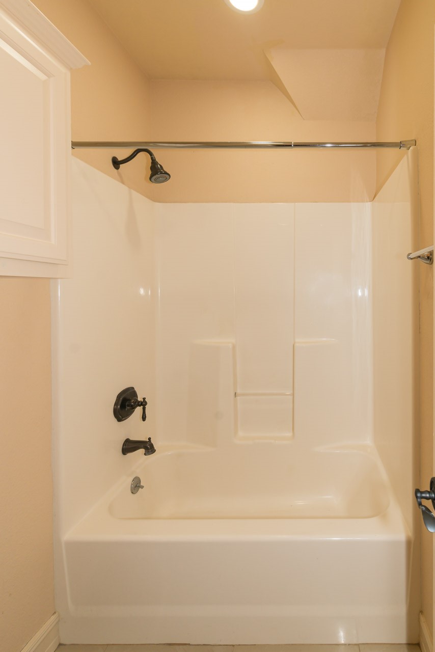 7 Stonebrook Court Beaumont, TX 77706 - Photo 30 of 35 a bathroom with a shower