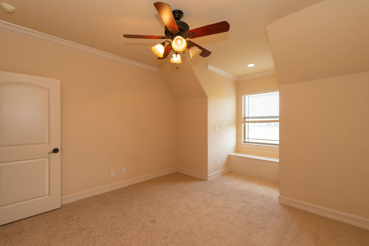 7 Stonebrook Court Beaumont, TX 77706 - Photo 31 of 35 a view of an empty room with a window