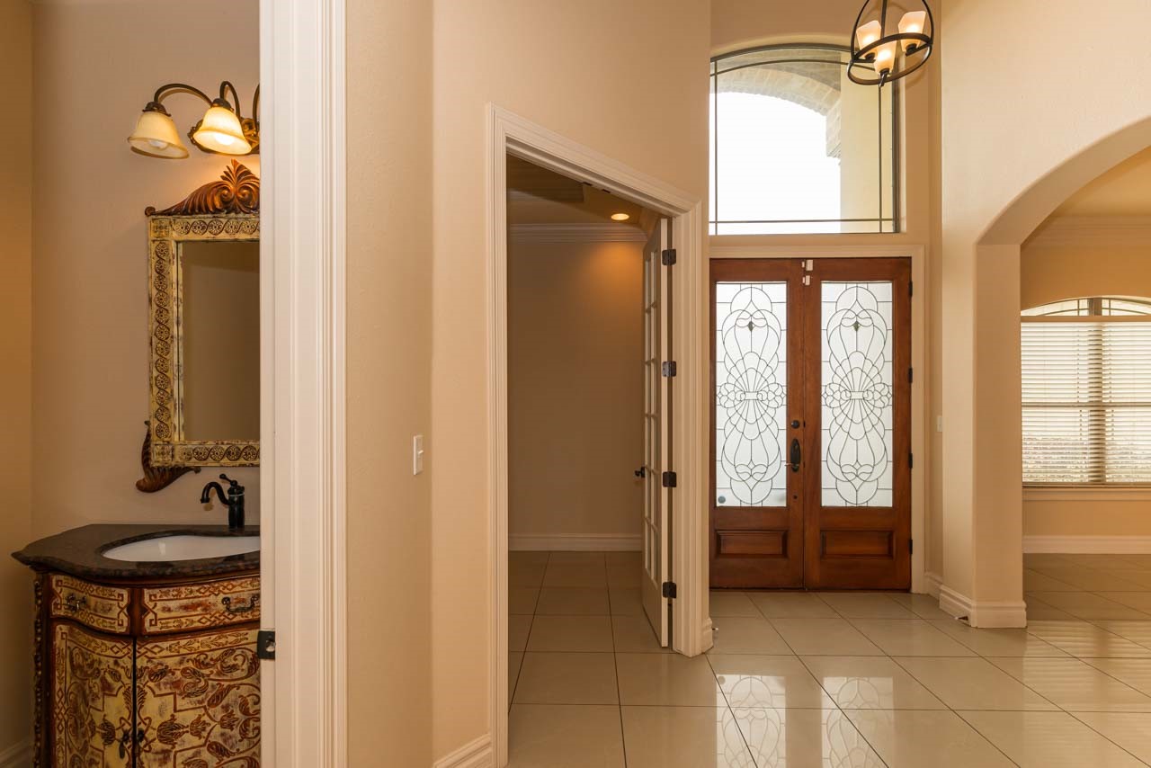 7 Stonebrook Court Beaumont, TX 77706 - Photo 9 of 35 a view of an entryway with a door