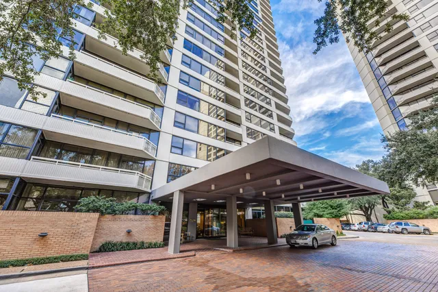 a view of a car park in front of building