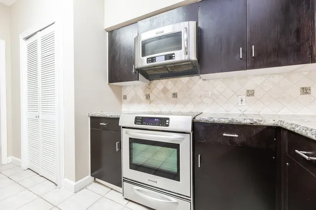 a bathroom with a sink and a stove