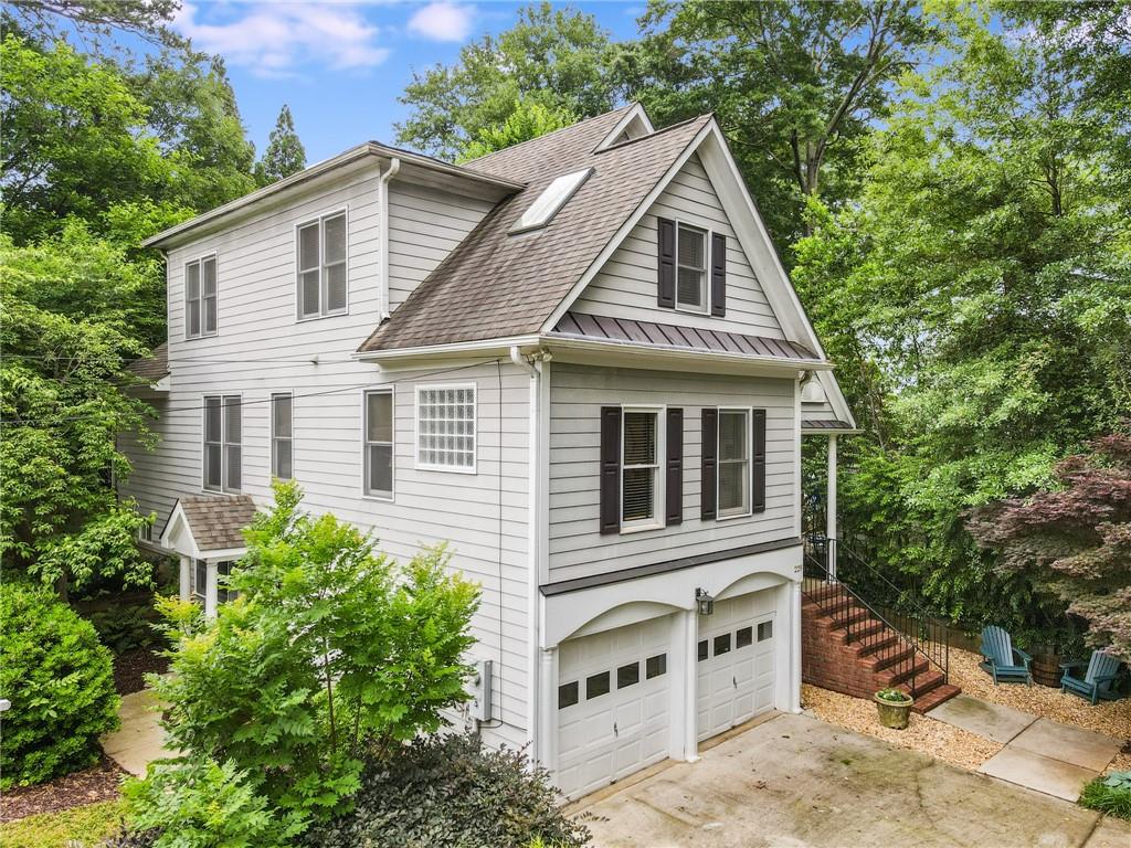 229 Lockwood Terrace Decatur, GA 30030 - Photo 1 of 1 a front view of a house with a yard