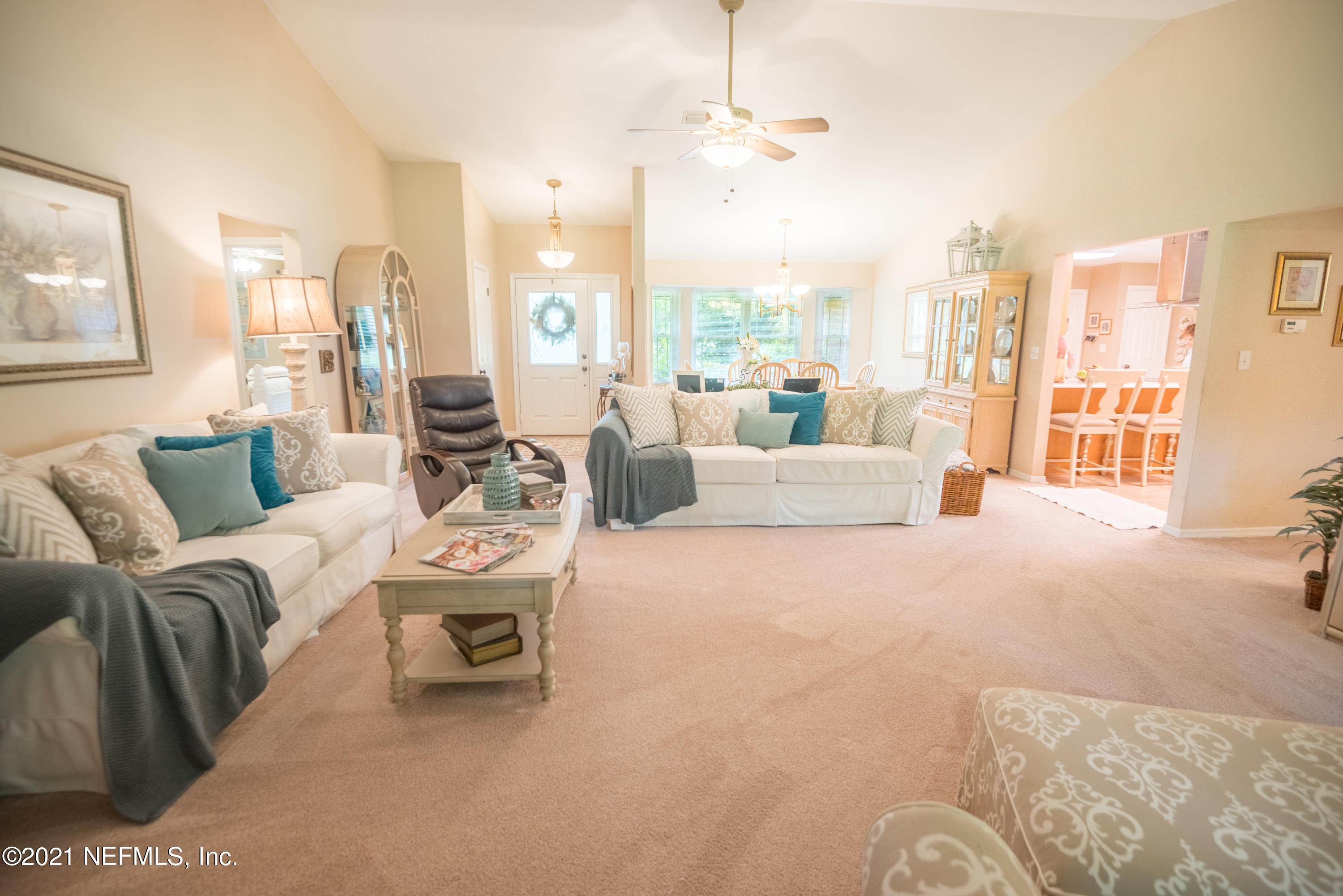 5200 Northwest 180th Way Starke, FL 32091 - Photo 12 of 83 a living room with furniture and a large window