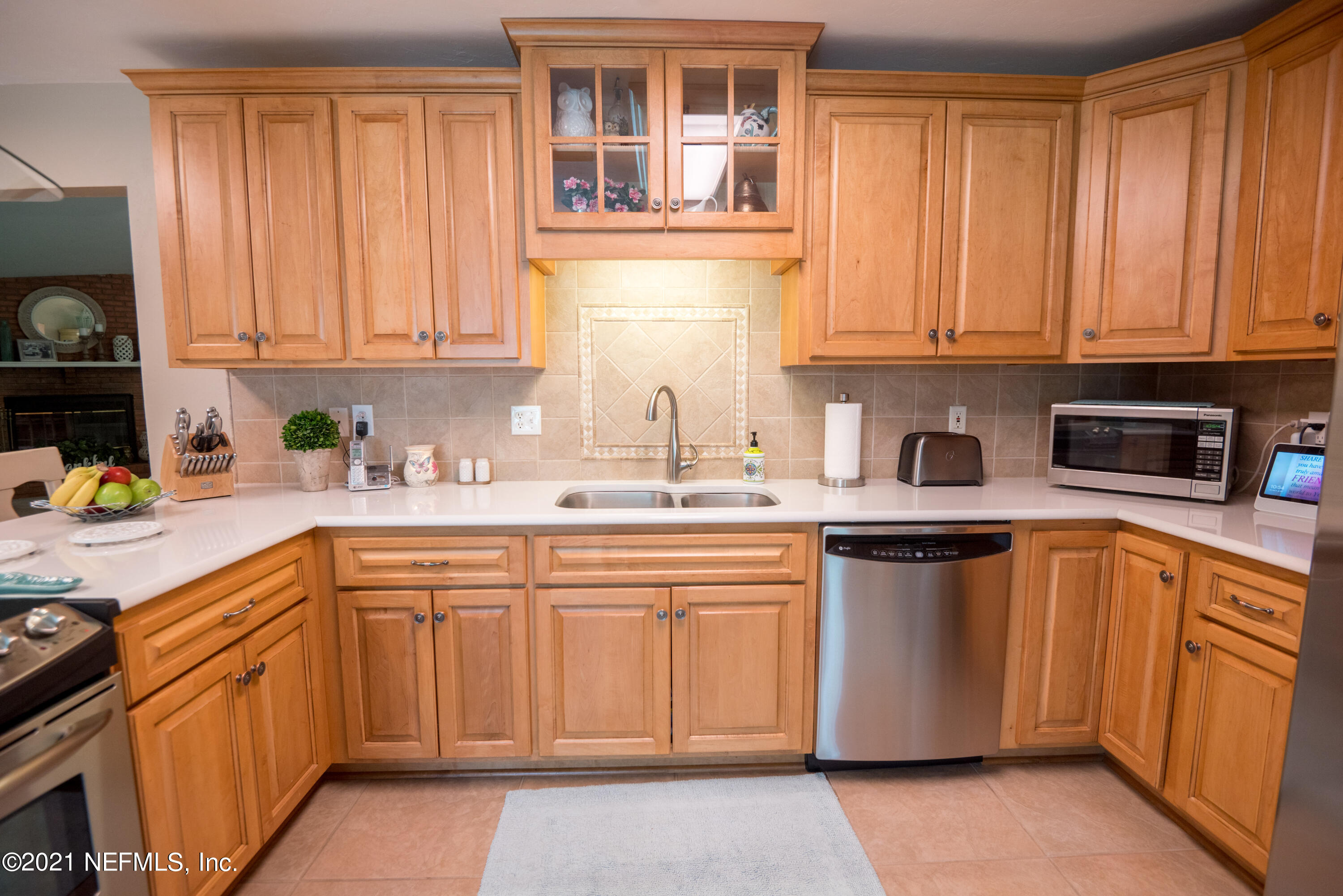 5200 Northwest 180th Way Starke, FL 32091 - Photo 19 of 83 a kitchen with stainless steel appliances granite countertop a sink and dishwasher