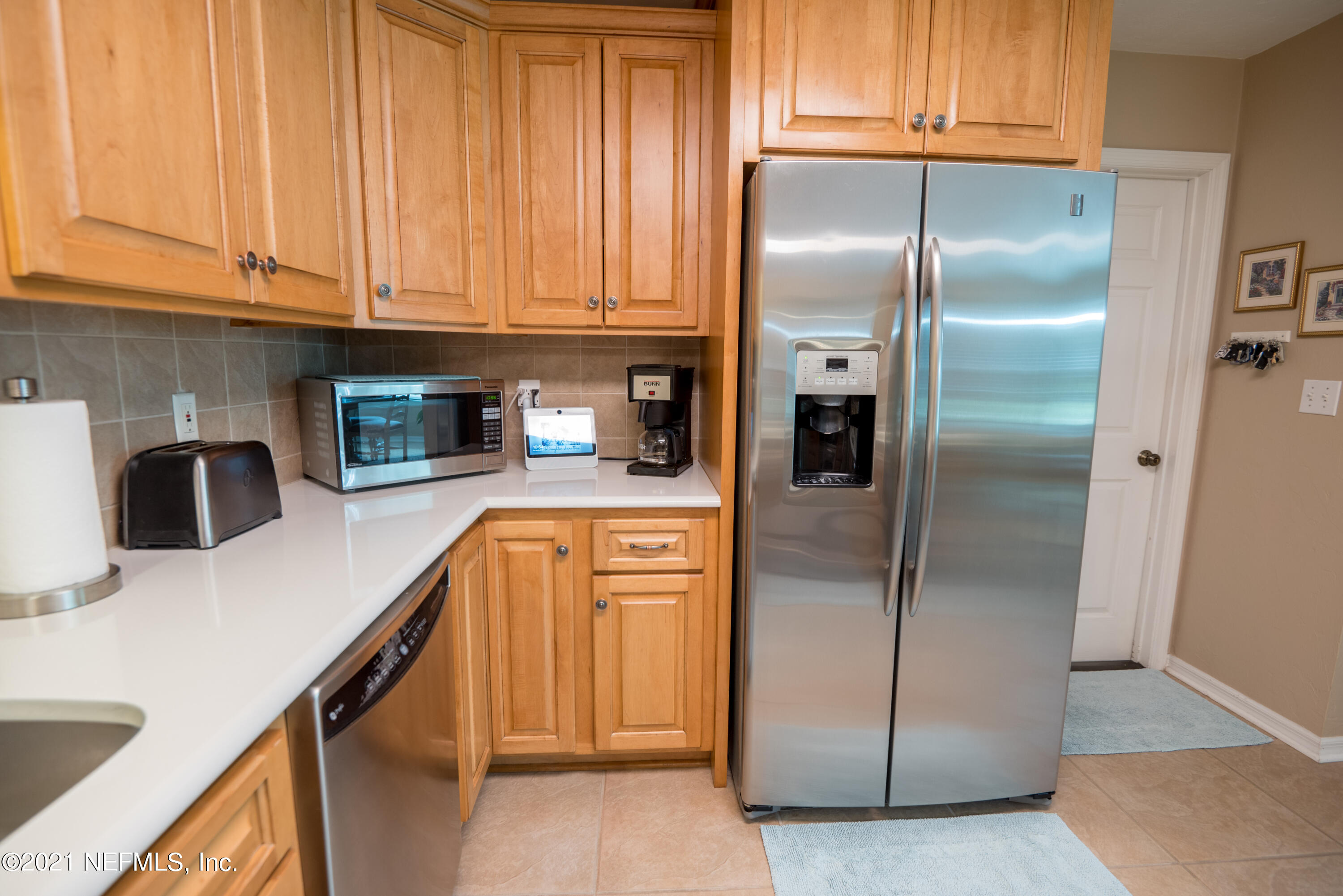 5200 Northwest 180th Way Starke, FL 32091 - Photo 26 of 83 a kitchen with stainless steel appliances granite countertop a refrigerator and a sink