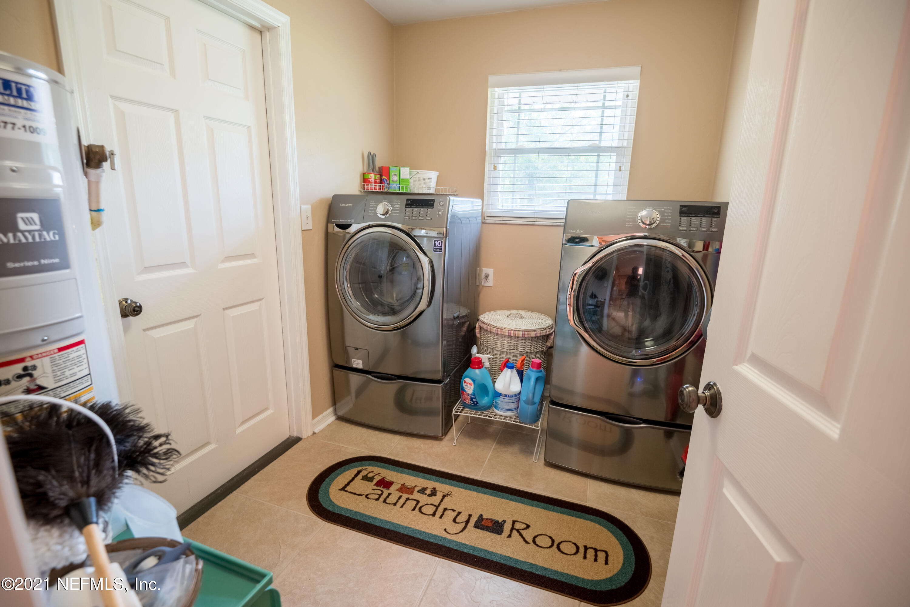 5200 Northwest 180th Way Starke, FL 32091 - Photo 29 of 83 a utility room with dryer and washer