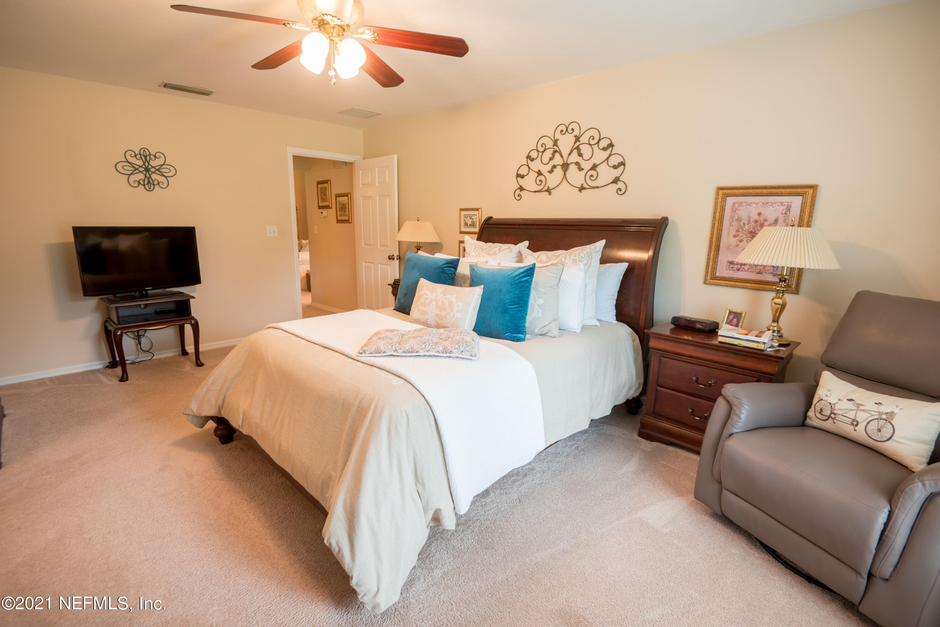 5200 Northwest 180th Way Starke, FL 32091 - Photo 35 of 83 a bed room with a bed window and a couch
