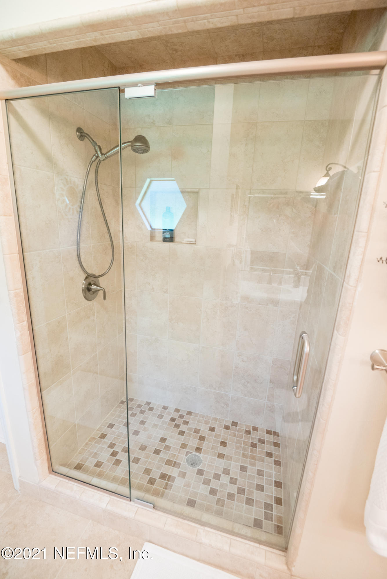 5200 Northwest 180th Way Starke, FL 32091 - Photo 44 of 83 a bathroom with a glass shower door