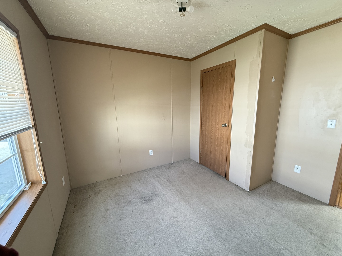 1712 South Dixie Highway, Unit 248 Crete, IL 60417 - Photo 13 of 19 a view of an empty room with a window
