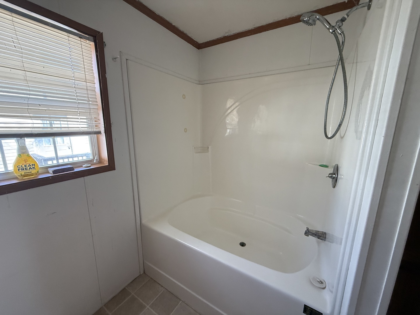 1712 South Dixie Highway, Unit 248 Crete, IL 60417 - Photo 16 of 19 a bathroom with a bath tub and a shower