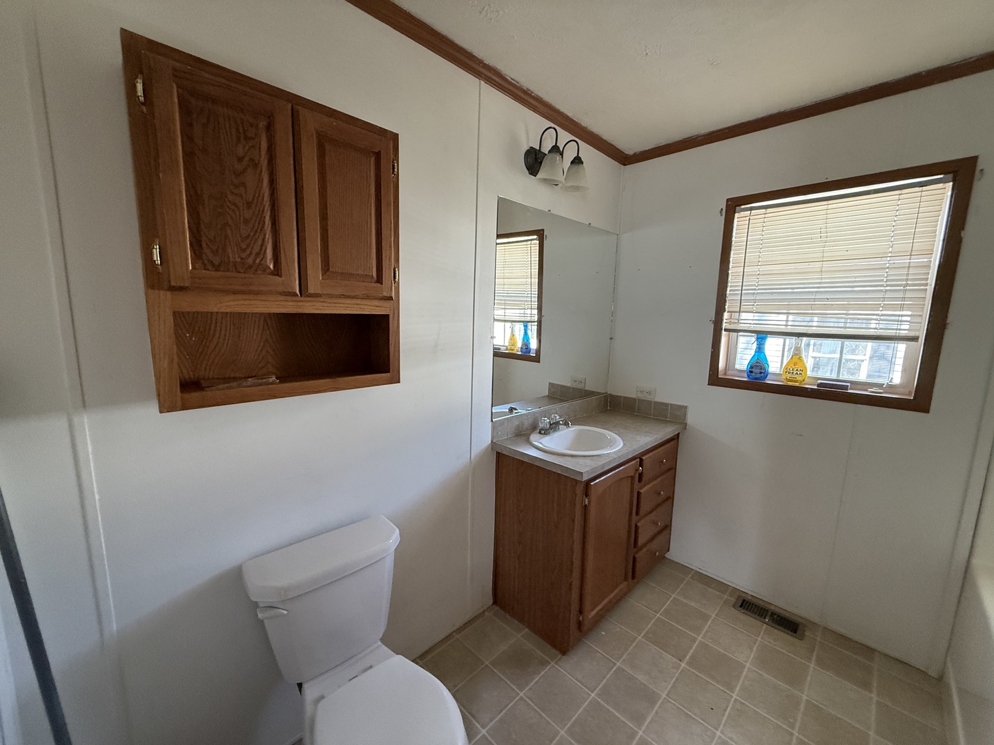 1712 South Dixie Highway, Unit 248 Crete, IL 60417 - Photo 17 of 19 a room with a stove and a microwave