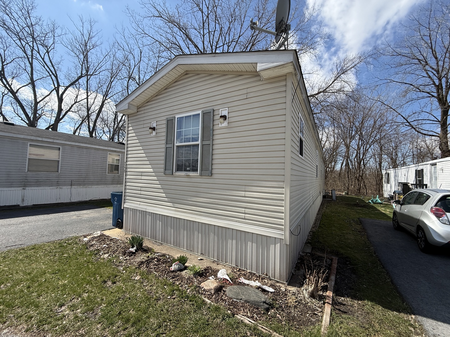1712 South Dixie Highway, Unit 248 Crete, IL 60417 - Photo 18 of 19 a front view of a house with a yard