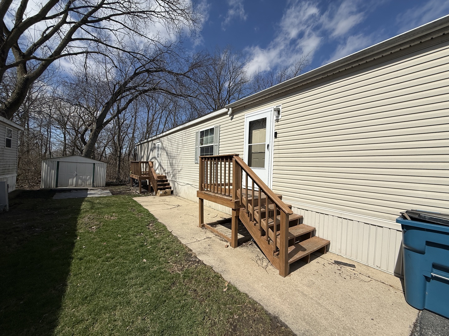 1712 South Dixie Highway, Unit 248 Crete, IL 60417 - Photo 19 of 19 a view of a house with backyard and a trees