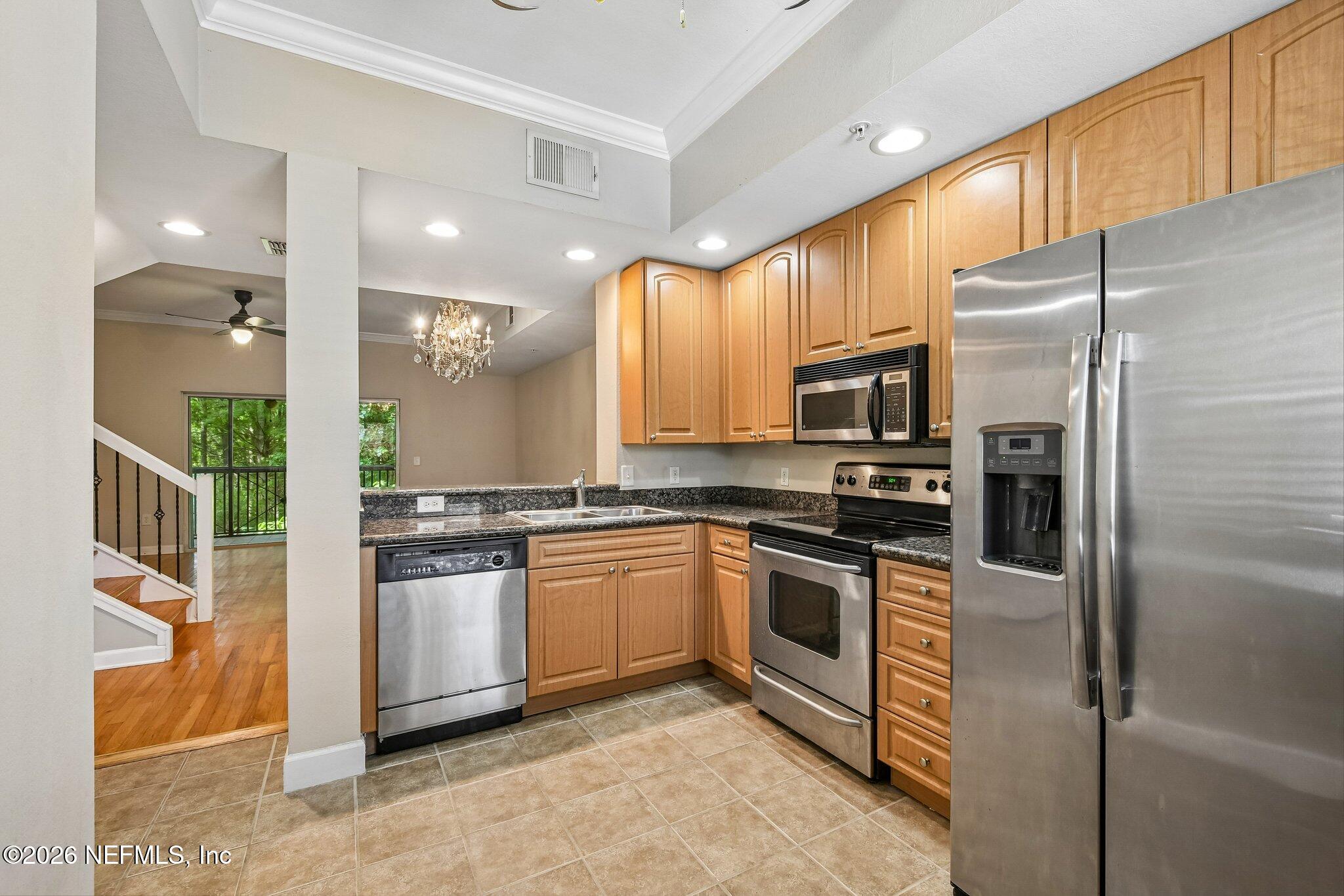 9745 Touchton Road, Unit 1129 Jacksonville, FL 32246 - Photo 18 of 57 Kitchen w/Stainless Appliances