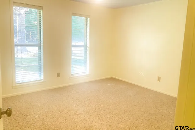 a view of a room that has a window in it