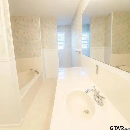 a bathroom with a bathtub