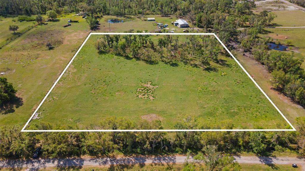 11041 Revell Road Parrish, FL 34219 - Photo 1 of 11 a view of a swimming pool