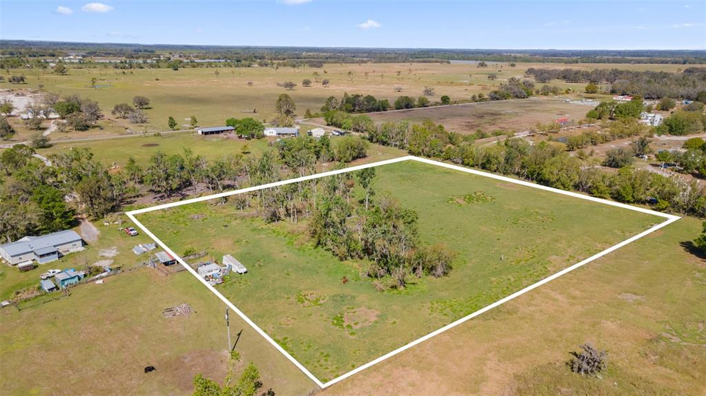 11041 Revell Road Parrish, FL 34219 - Photo 3 of 11 a view of a tennis court