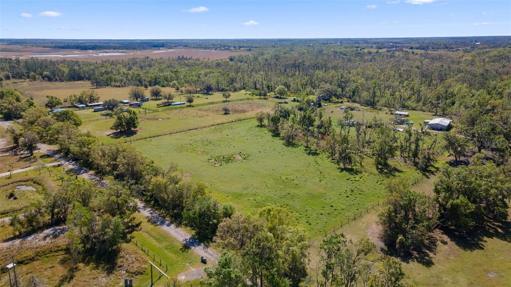 11041 Revell Road Parrish, FL 34219 - Photo 5 of 11 a view of a town with mountains in the background